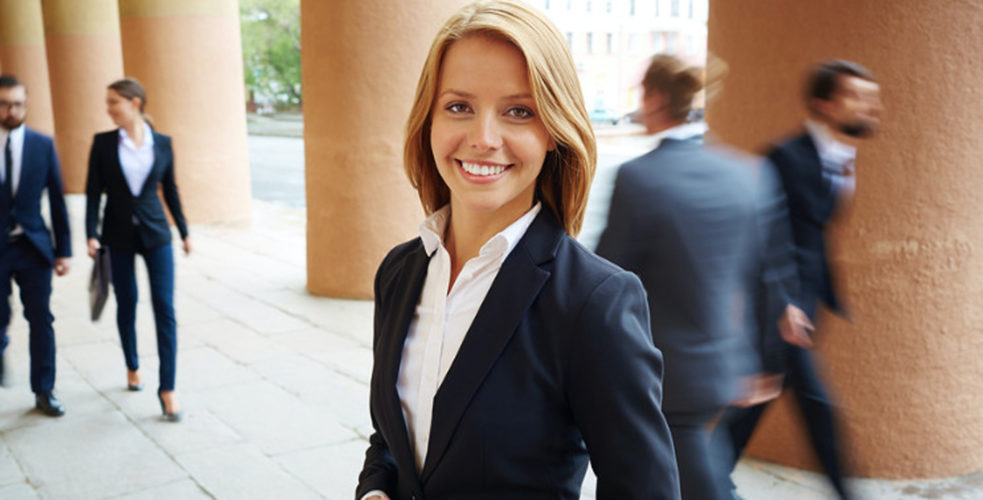 business woman in suit smiling